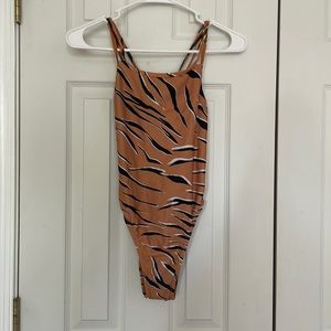 Size 28 tiger print (only worn twice)